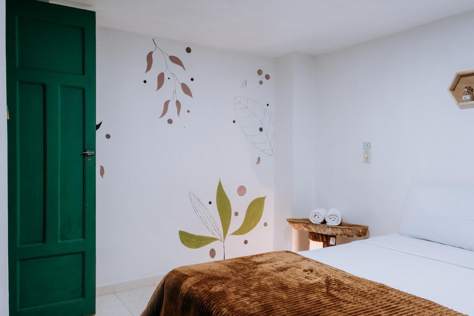 Origen Hostel Jardín Extérieur photo